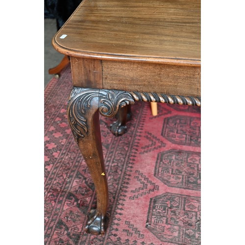 231 - # A large 19th century mahogany extending dining table (without any leaves) in two sections, the rou... 