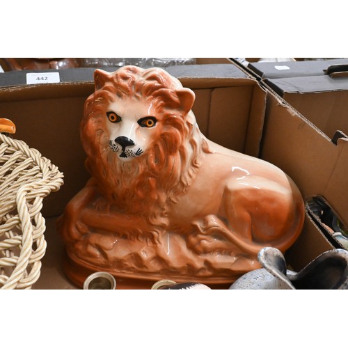 386 - A Staffordshire pottery recumbent lion, 24 x 28 cm, to/w a pottery basketweave comport and other orn... 