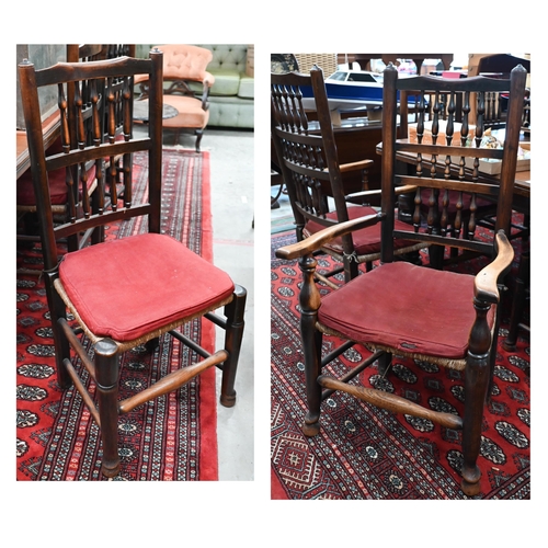 103 - A set of eight ash Lancashire spindleback chairs with rush seats, (two carvers and six standard) (8)