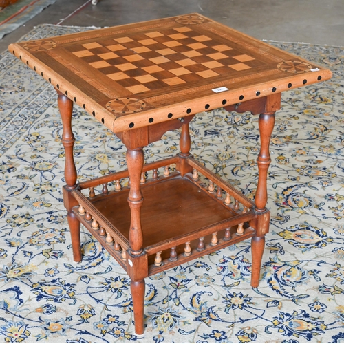 109 - A hardwood marquetry square games table with turned supports and undertier, 65 x 65 x 72 cm high