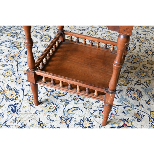 109 - A hardwood marquetry square games table with turned supports and undertier, 65 x 65 x 72 cm high