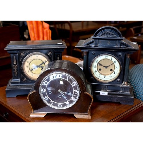 120 - Two late 19th century architectural ebonised mantle clocks to/w a 1930s triple train clock (3)