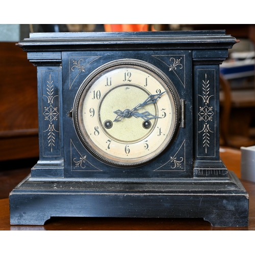 120 - Two late 19th century architectural ebonised mantle clocks to/w a 1930s triple train clock (3)