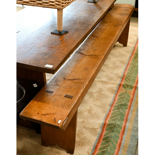 121 - A pair of antique stained pine benches, 250 cm long x 48 cm high