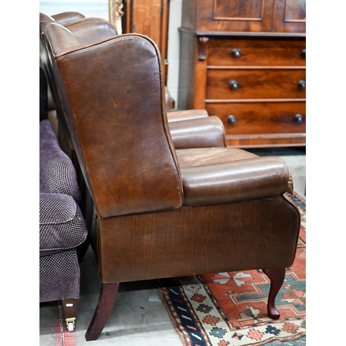 124 - A pair of brown leather Laura Ashley recliner wingback armchairs (2)