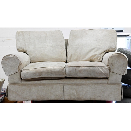 128 - A modern two seated sofa (a/f - missing feet), champagne fabric, 160 x 85 x 90 cm, with Laura Ashley... 