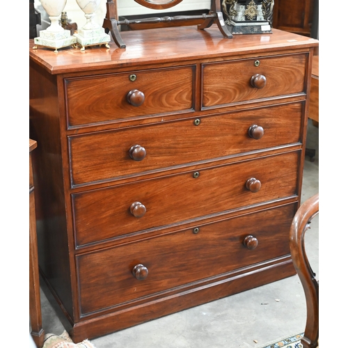 132 - A 19th century mahogany chest of drawers of two short over three long drawers with turned handles an... 