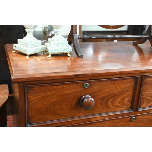 132 - A 19th century mahogany chest of drawers of two short over three long drawers with turned handles an... 