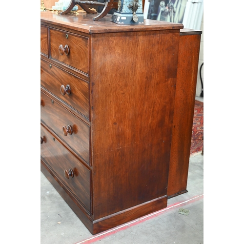 132 - A 19th century mahogany chest of drawers of two short over three long drawers with turned handles an... 