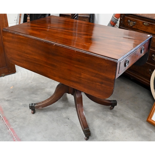 133 - # A 19th century mahogany drop leaf table with drawer to one end and opposing dummy drawer, with tur... 