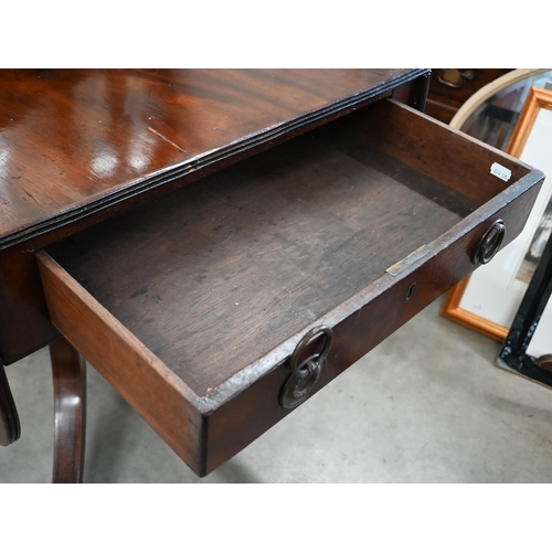 133 - # A 19th century mahogany drop leaf table with drawer to one end and opposing dummy drawer, with tur... 