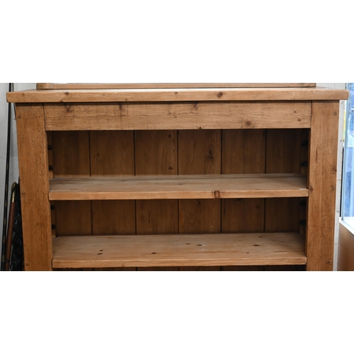 134 - A modern rustic pine open bookcase with adjustable shelves and two drawers, 120 x 36 x 122 cm high