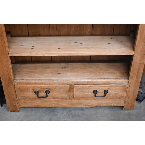 134 - A modern rustic pine open bookcase with adjustable shelves and two drawers, 120 x 36 x 122 cm high