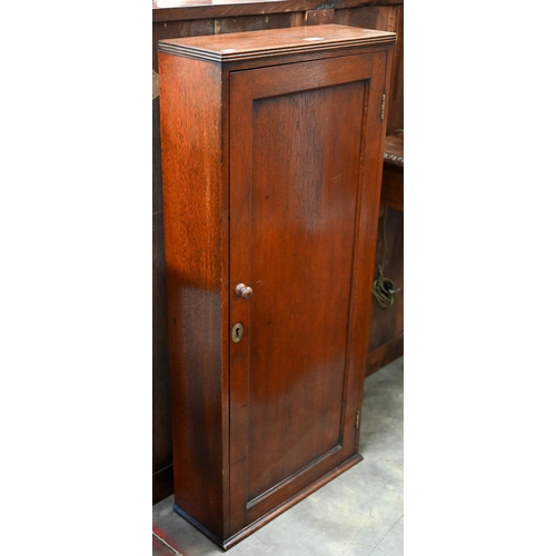 137 - A 19th century mahogany maritime yachts drinks cabinet fitted with bottle apertures and glass racks ... 