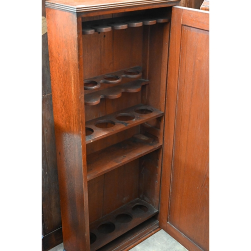 137 - A 19th century mahogany maritime yachts drinks cabinet fitted with bottle apertures and glass racks ... 