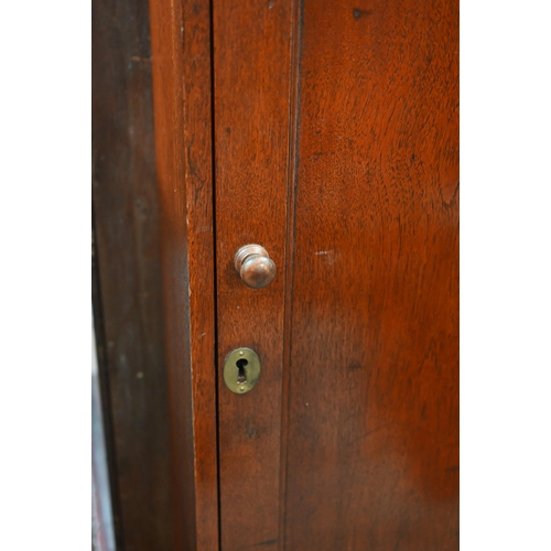 137 - A 19th century mahogany maritime yachts drinks cabinet fitted with bottle apertures and glass racks ... 