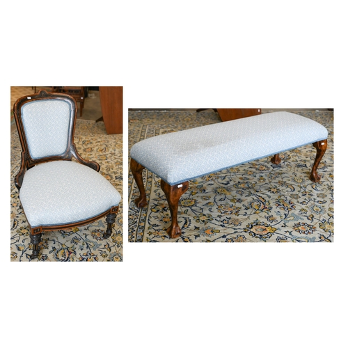 141 - A walnut framed footstool with blue and white patterned fabric and cabriole supports, 108 x 40 x 42 ... 