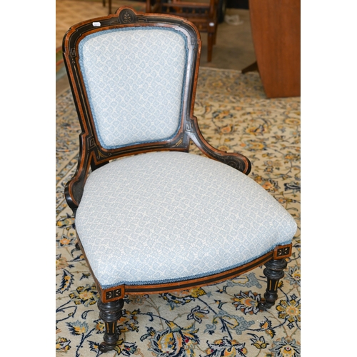 141 - A walnut framed footstool with blue and white patterned fabric and cabriole supports, 108 x 40 x 42 ... 