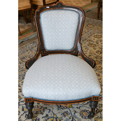 141 - A walnut framed footstool with blue and white patterned fabric and cabriole supports, 108 x 40 x 42 ... 