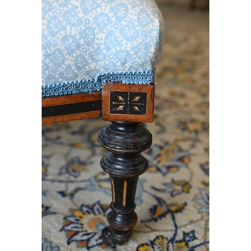 141 - A walnut framed footstool with blue and white patterned fabric and cabriole supports, 108 x 40 x 42 ... 