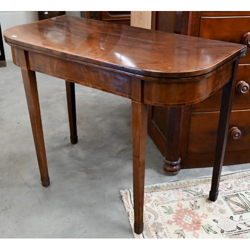 146 - A 19th century mahogany folding tea table, 98 x 48 x 74 cm high