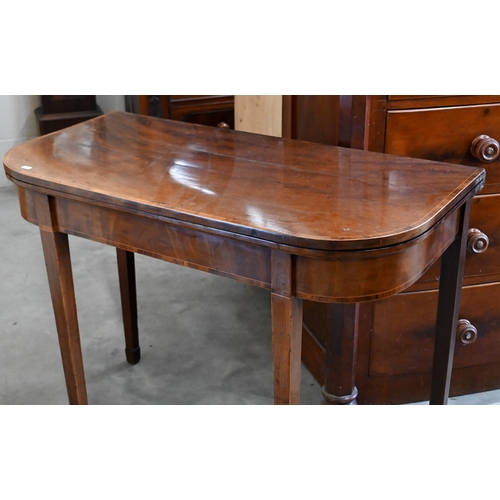 146 - A 19th century mahogany folding tea table, 98 x 48 x 74 cm high