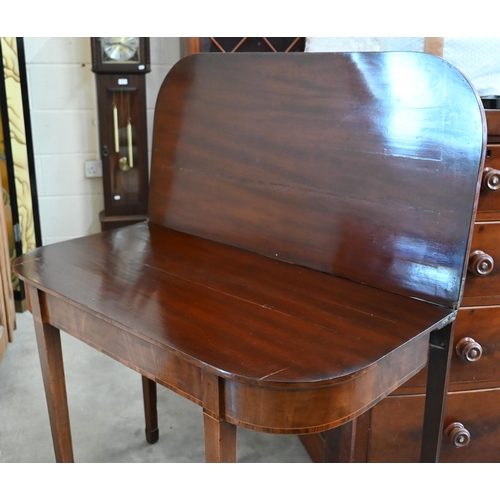 146 - A 19th century mahogany folding tea table, 98 x 48 x 74 cm high