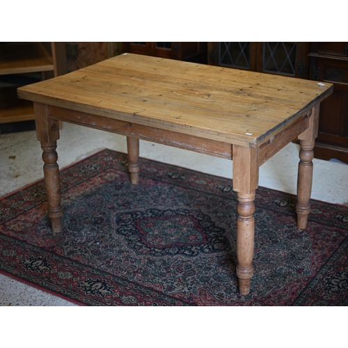 150 - A pine rectangular kitchen dining table with end drawer and turned legs, 120 x 80 x 73 cm