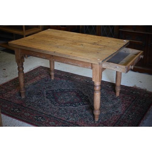 150 - A pine rectangular kitchen dining table with end drawer and turned legs, 120 x 80 x 73 cm