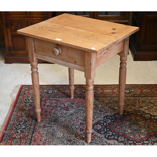 162 - A pine side table with single drawer and turned supports, 66 x 54 x 74 cm high