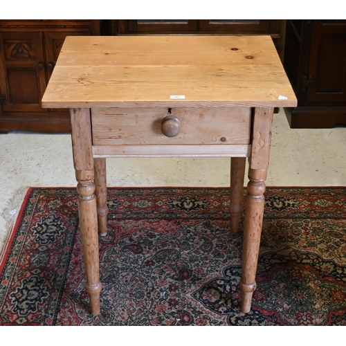 162 - A pine side table with single drawer and turned supports, 66 x 54 x 74 cm high