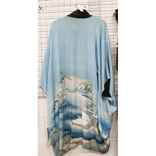 173 - A vintage Japanese reversible wedding kimono featuring watery landscapes with boats and figures