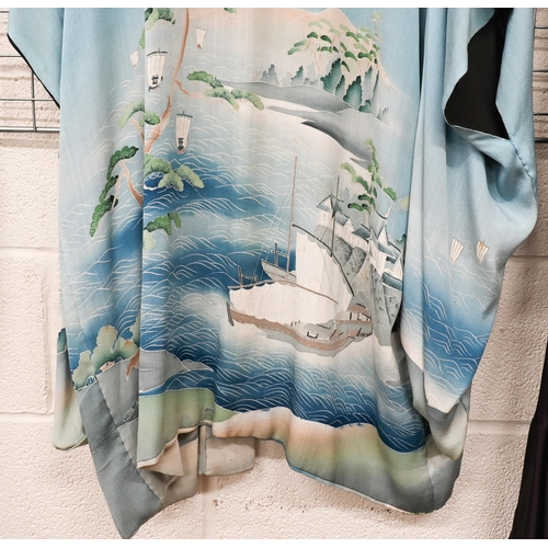 173 - A vintage Japanese reversible wedding kimono featuring watery landscapes with boats and figures