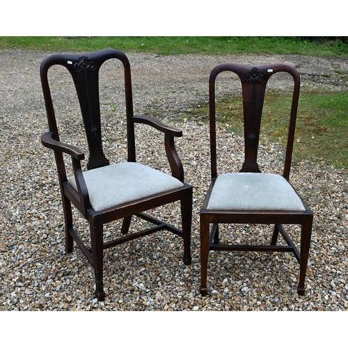 175 - A set of eight Art Nouveau floral carved mahogany dining chairs, 6 standard, 2 carvers (8)