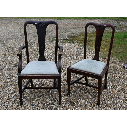 175 - A set of eight Art Nouveau floral carved mahogany dining chairs, 6 standard, 2 carvers (8)