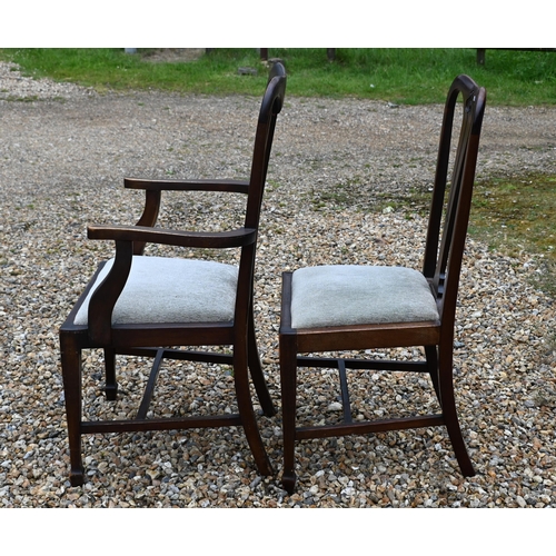 175 - A set of eight Art Nouveau floral carved mahogany dining chairs, 6 standard, 2 carvers (8)