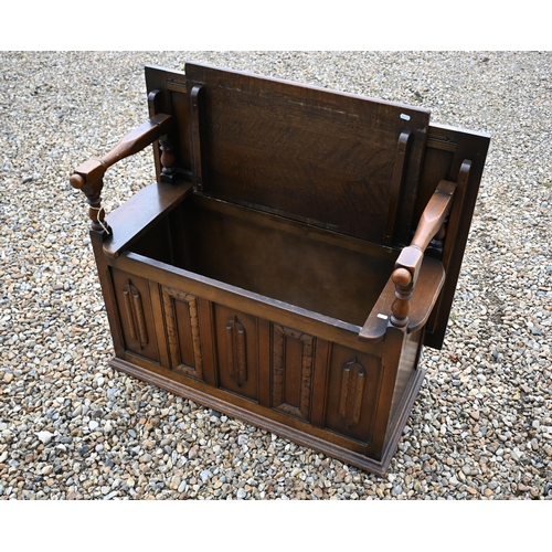 191 - A carved oak box seated Monk's bench, of panelled construction, 100 x 45 x 80 cm high