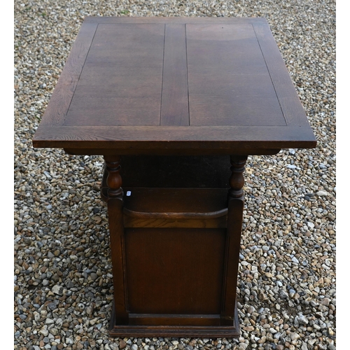 191 - A carved oak box seated Monk's bench, of panelled construction, 100 x 45 x 80 cm high