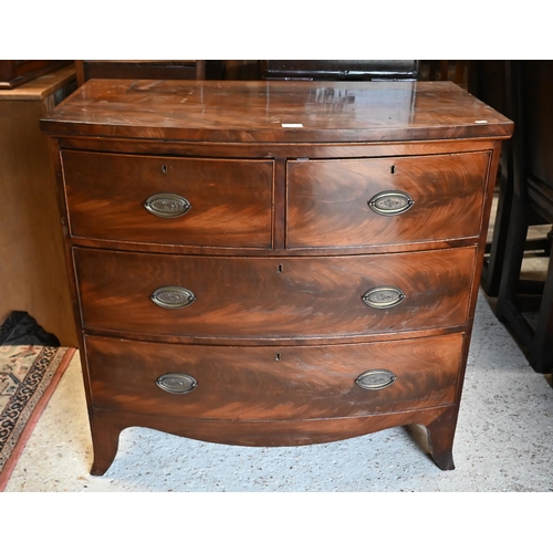 194 - A 19th century mahogany bowfront chest of two short over two long drawers on splayed feet, 92 x 50 x... 