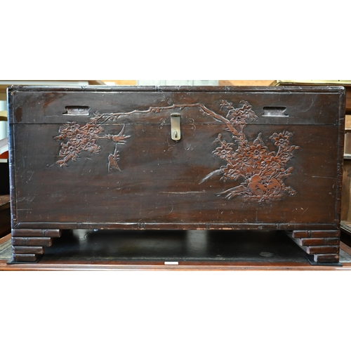 196 - A Chinese camphorwood trunk carved with birds, bamboo and prunus, 94 x 44 x 50 cm high