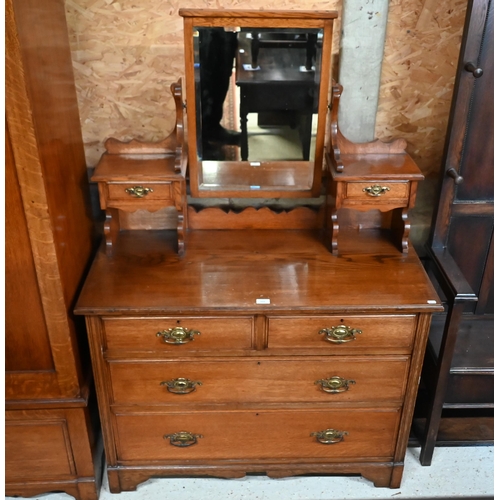 203 - # An Edwardian Golden Oak mirror backed dressing chest, 108 x 50 x 160 cm high