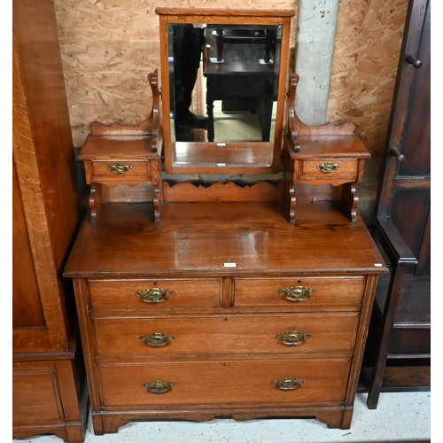 203 - # An Edwardian Golden Oak mirror backed dressing chest, 108 x 50 x 160 cm high