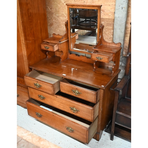 203 - # An Edwardian Golden Oak mirror backed dressing chest, 108 x 50 x 160 cm high