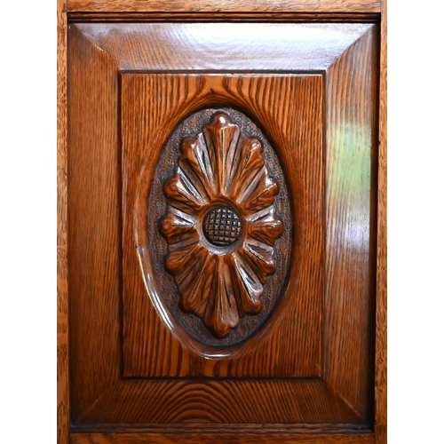 204 - An Edwardian Golden Oak wardrobe with mirrored door over single drawer, 130 x 55 x 205 cm