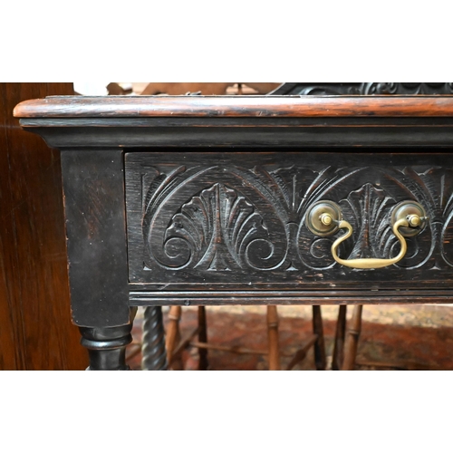 205 - An early 20th century carved oak hall table with two drawers and spiral turned supports united by st... 