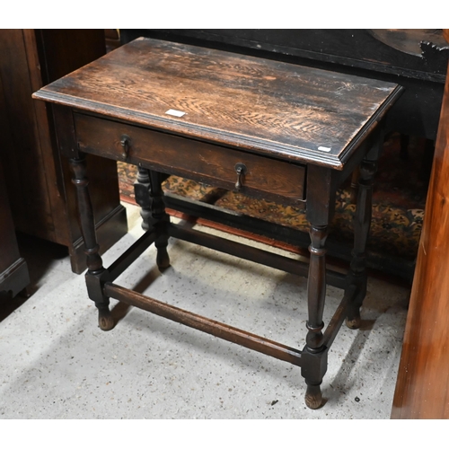 206 - An antique oak side table with single drawer, on turned supports and stretchers, 76 x 45 x 74 cm hig... 