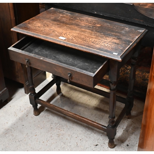 206 - An antique oak side table with single drawer, on turned supports and stretchers, 76 x 45 x 74 cm hig... 