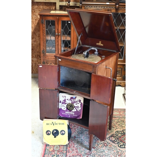 233 - # An early 20th century mahogany 'Academy' gramophone cabinet, 50 x 50 x 100 cm and selection of dis... 