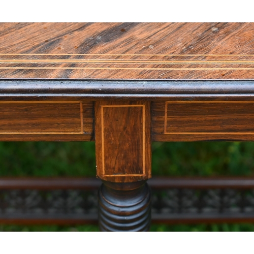 241 - # An Edwardian rosewood inlaid octagonal table on turned supports united by fret-cut cross stretcher... 