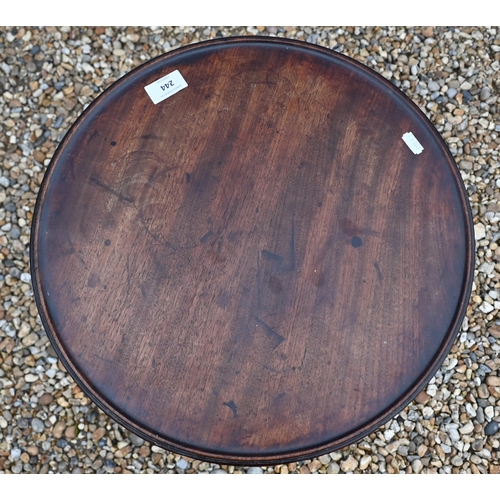 244 - A 19th century mahogany circular occasional table on turned column and triform supports, 40 cm dia x... 